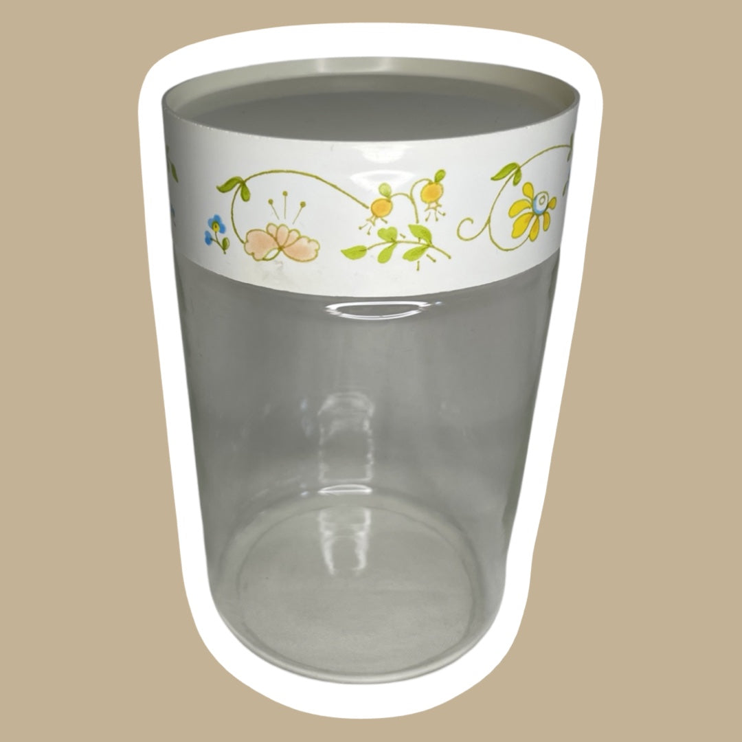 Bote de vidrio con tapa y diseño floral de la década de 1970 de Corning Pyrex con diseño de flores silvestres