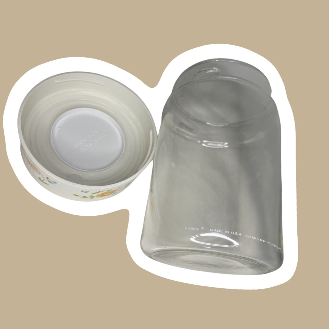 Bote de vidrio con tapa y diseño floral de la década de 1970 de Corning Pyrex con diseño de flores silvestres