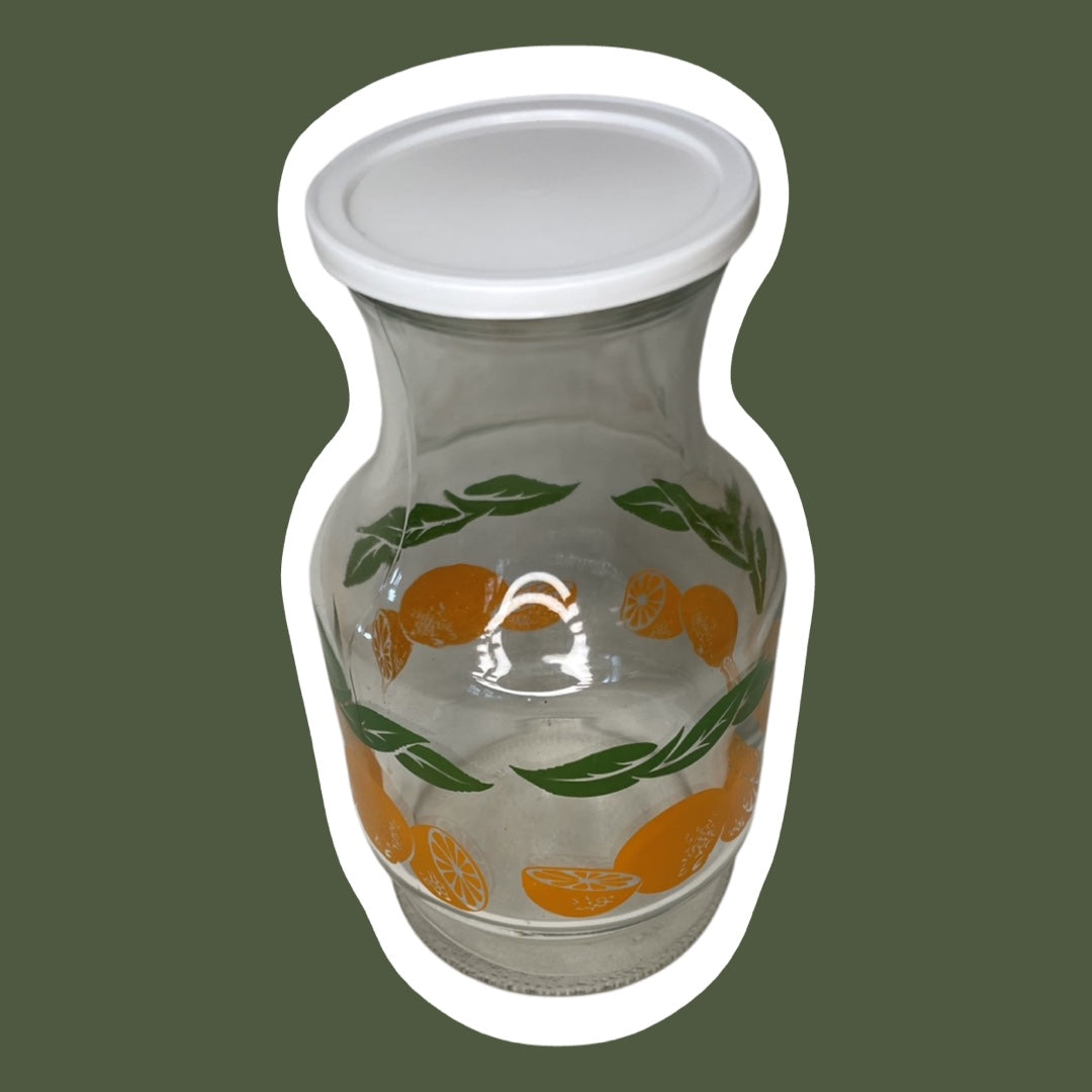 Jarra para jugo con tapa y diseño de frutas anaranjadas de los años 70, de Anchor Hocking