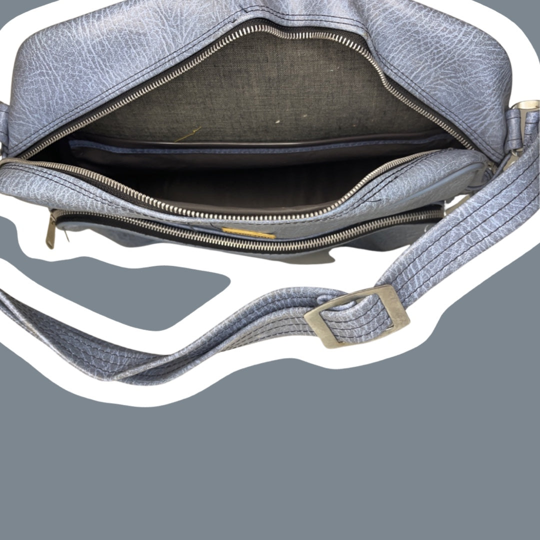 Bolso de viaje de mano en color azul bebé 'Flying Time'