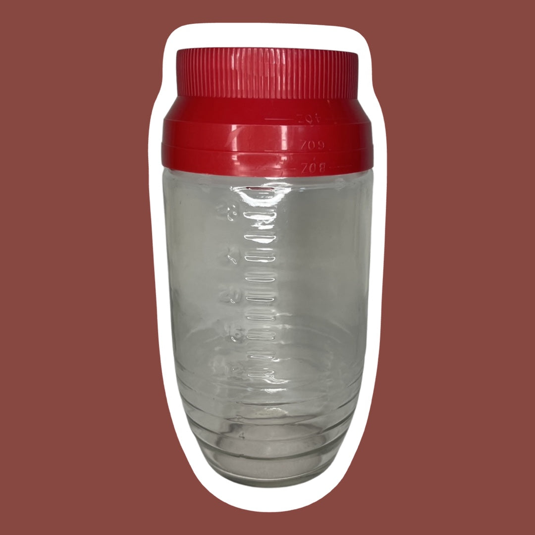 Tarro de vidrio para medir y almacenar con tapa roja 'Anchor Hocking'