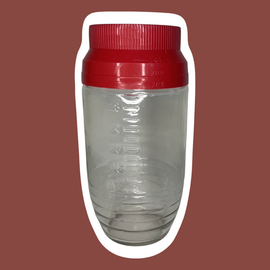 Tarro de vidrio para medir y almacenar con tapa roja 'Anchor Hocking'