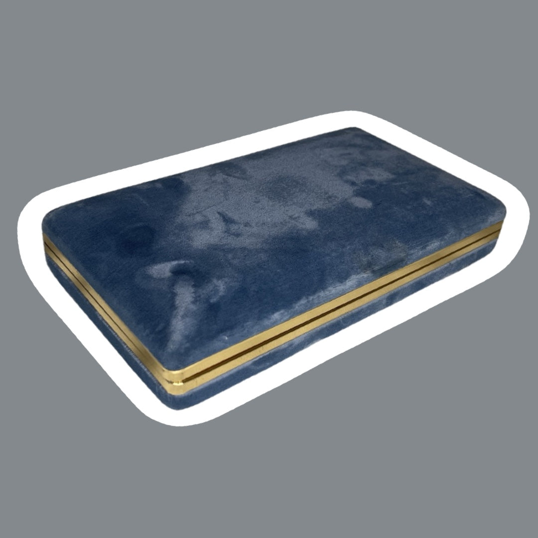 Estuche de viaje para joyas de terciopelo azul con interior dorado